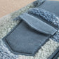 Fleece pramsuit chest patch pocket detail with blue corduroy flap and edging