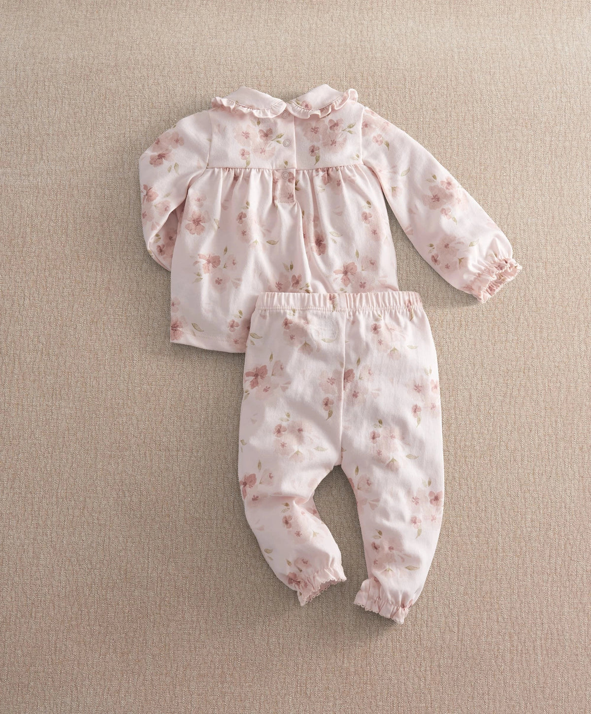 Watercolour floral pyjama set in pale pink, long-sleeve top and cuffed long trousers