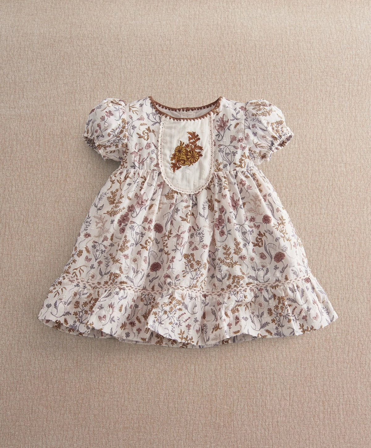 Floral dress with puff sleeves, embroidered bib and tiered ruffle skirt