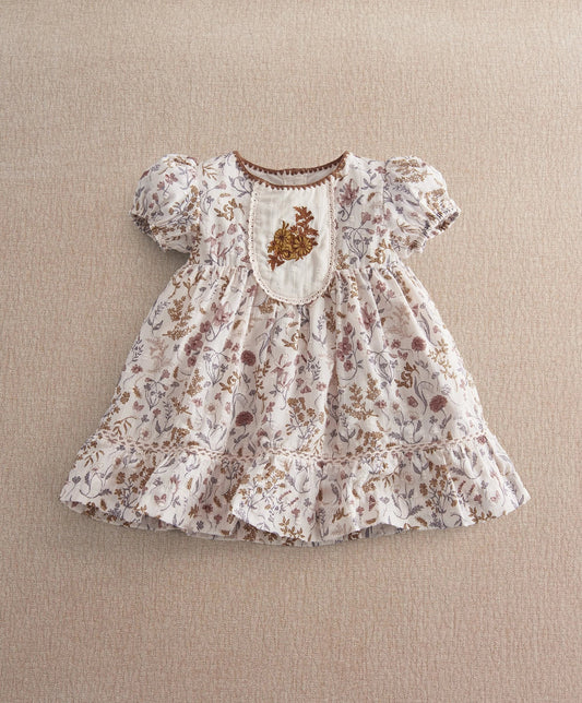 Floral dress with puff sleeves, embroidered bib and tiered ruffle skirt
