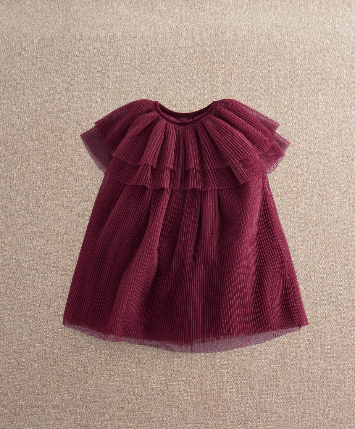 Burgundy pleated cape dress with short flutter overlay