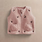 Pink fleece gilet with front zipper, two flap pockets, embroidered dot patches