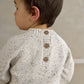 Children's lion knit jumper back view, cream speckled with buttoned back placket