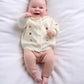 Cream embroidered knit cardigan and mauve knit leggings set, button front and ribbed cuffs.