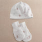 White printed baby hat and mittens set with animal motifs