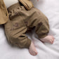 Tan quilted jacket and joggers set with snail face prints