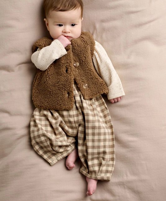 Brown borg waistcoat with white bodysuit and plaid trousers outfit for baby