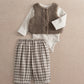 Brown borg vest with white bodysuit and gray plaid trousers outfit