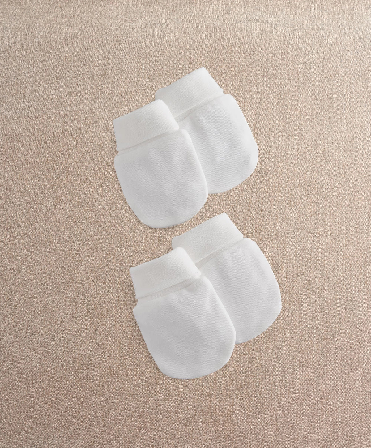 White scratch mittens (two-pack) with folded cuffs, side view