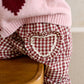 Pink heart cardigan with dark red intarsia and ribbed hem trim