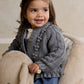 Gray knit bobble cardigan with button placket and textured sleeves