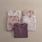 5-pack baby bodysuits in light pink, plum purple, and white with berry-and-leaf print