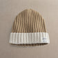Brown and white knitted beanie with ribbed knit and BORN WILD logo patch