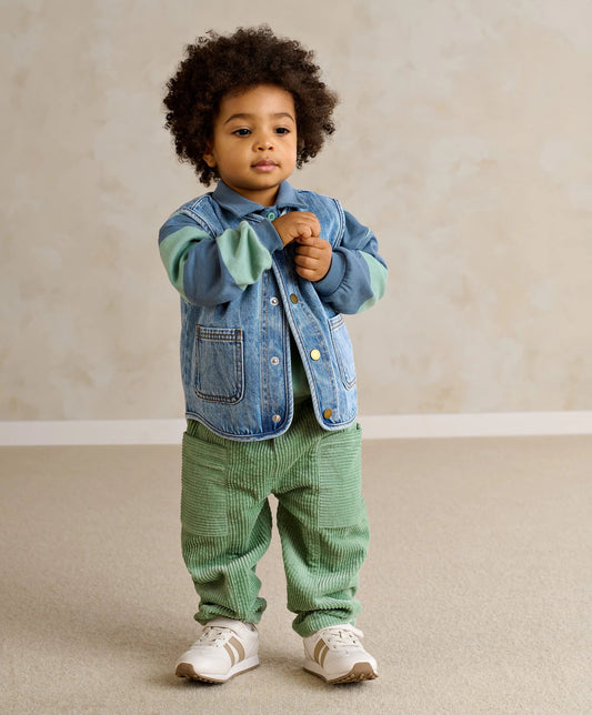 Green cord trousers for kids, elastic waist and gathered cuffs, full-length