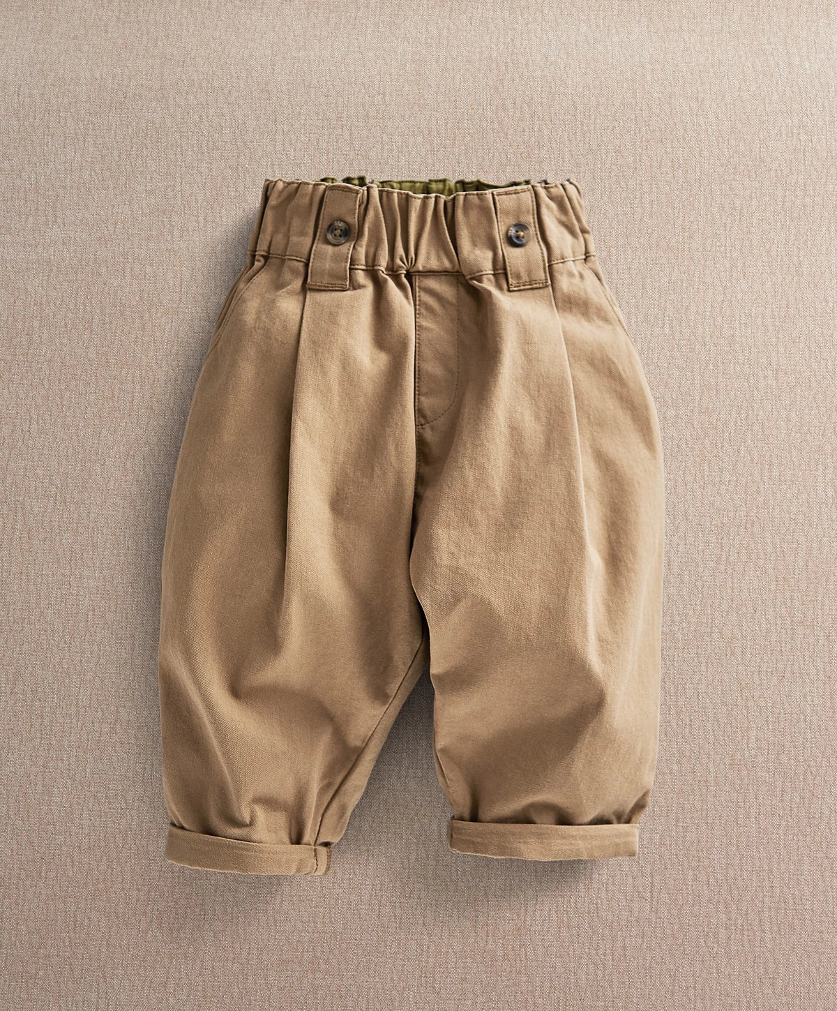 Tan toddler trousers with button waist and cuffed legs