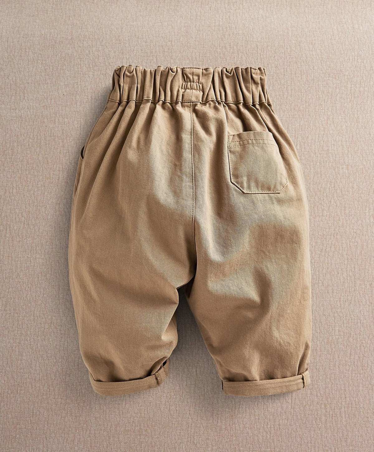 Tan toddler trousers with elastic waist and side pocket