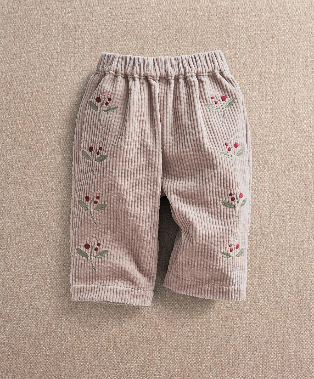 Berry cord trousers with allover floral print, elastic waist and relaxed straight legs
