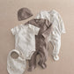 5-piece baby clothing set with gray hat, gray outfit, white printed footie, bib, bodysuit