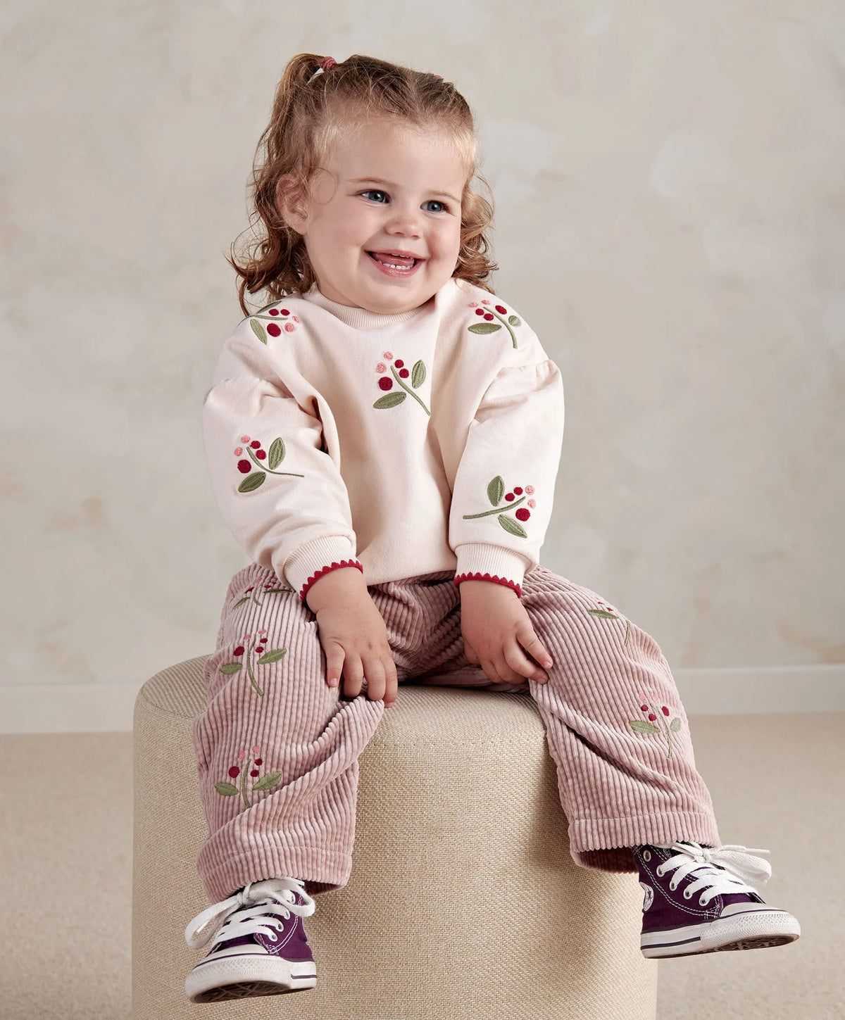 Cream baby sweatshirt with berry and leaf embroidery, ribbed cuffs and hem