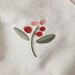 Cream sweatshirt chest embroidery of red berries and green leaves with small flowers