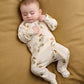 White acorn & leaf print zip-front baby all-in-one with footed legs