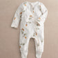 White acorn & leaf print zip-front baby all-in-one, long sleeves
