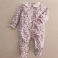 Ditsy floral baby romper with snap button front and long sleeves