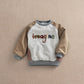 Speckled raglan sweatshirt with 'imagine' graphic, beige sleeves, gray trim