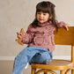 Red gingham jacket with heart pocket detail and ruffled bow neckline