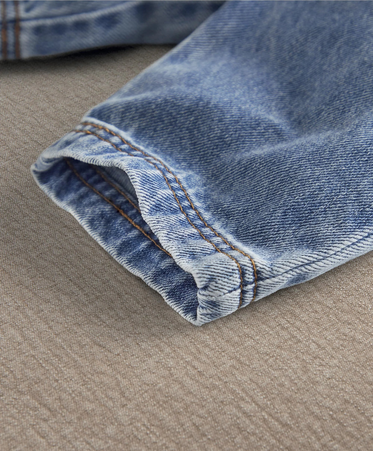 Denim shorts cuff with contrast stitching and folded hem
