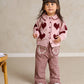 Red gingham trousers with elastic waist, ruffled cuffs and heart-shaped pocket appliques