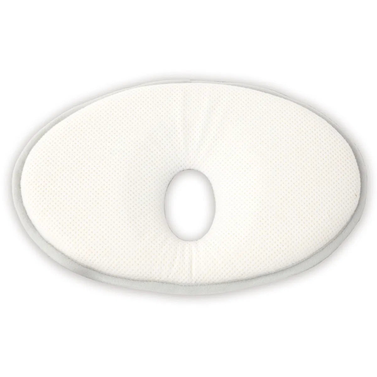 White oval baby pillow with central cutout, textured fabric cover