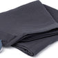 Grey tetra breastfeeding cloth folded with a teether ring