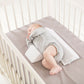 Baby sleep pillow on crib bedding, light gray rectangular design