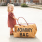 Brown teddy nursery bag with top handles, held by child, 'MOMMY BAG' text