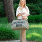 Canvas mommy bag in kaki green with brown handles and MOMMY BAG text