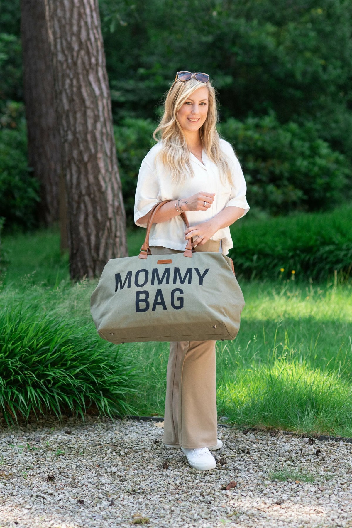 Canvas mommy bag in kaki green with brown handles and MOMMY BAG text