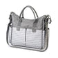 Grey diaper bag with top handles, zip closure, and patterned front pocket panel