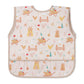 Light pink kids’ apron with colorful farm icons and front pocket