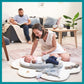 Anti-colic baby reducer pillow with gray and white cushions, supporting a sleeping infant