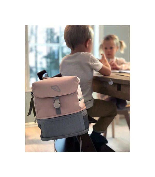 Pink kids crew backpack with top flap, front buckle and gray bottom panel