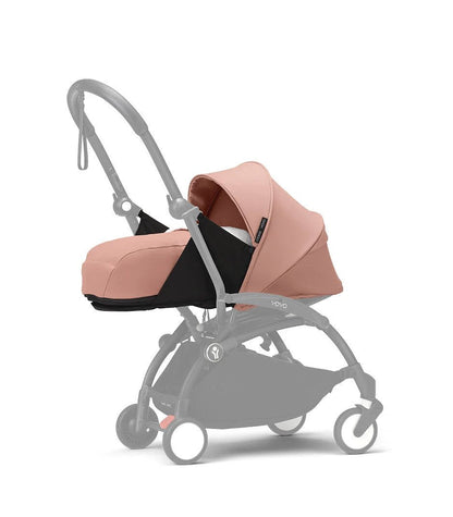 Newborn stroller pack with pink carrycot and seat, gray frame, front wheels