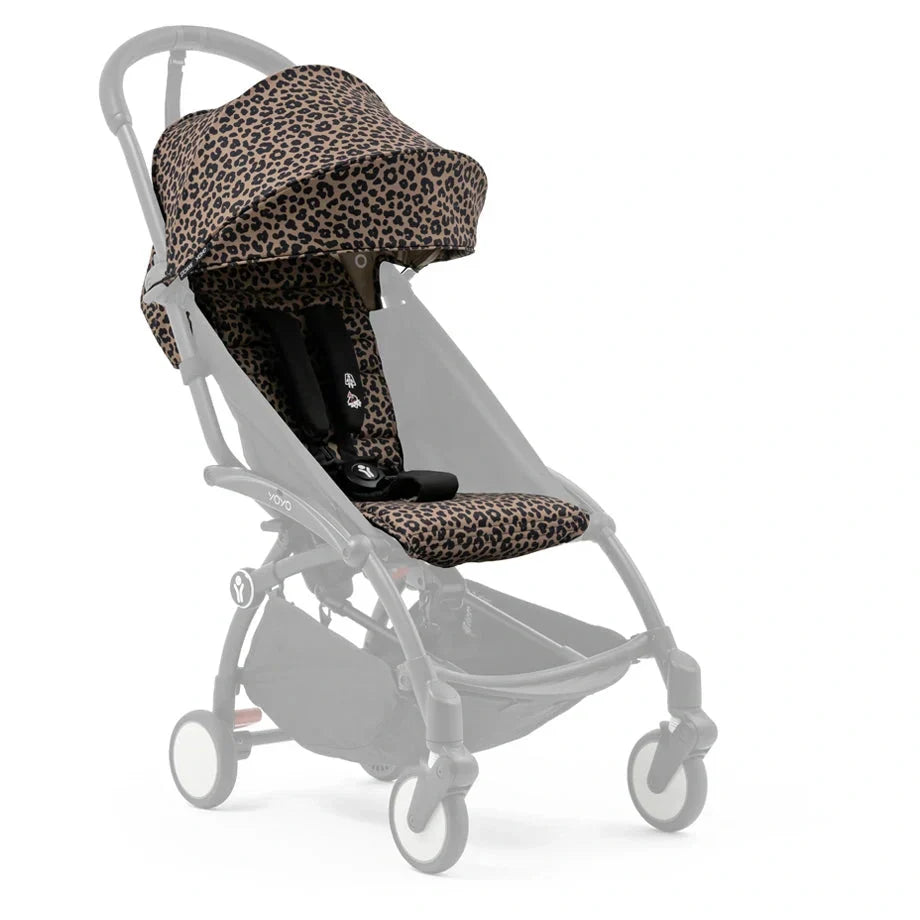 Leopard-print stroller with canopy and padded seat, black-and-brown upholstery