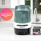 Bottle washer with teal lid and detergent tablets box on countertop