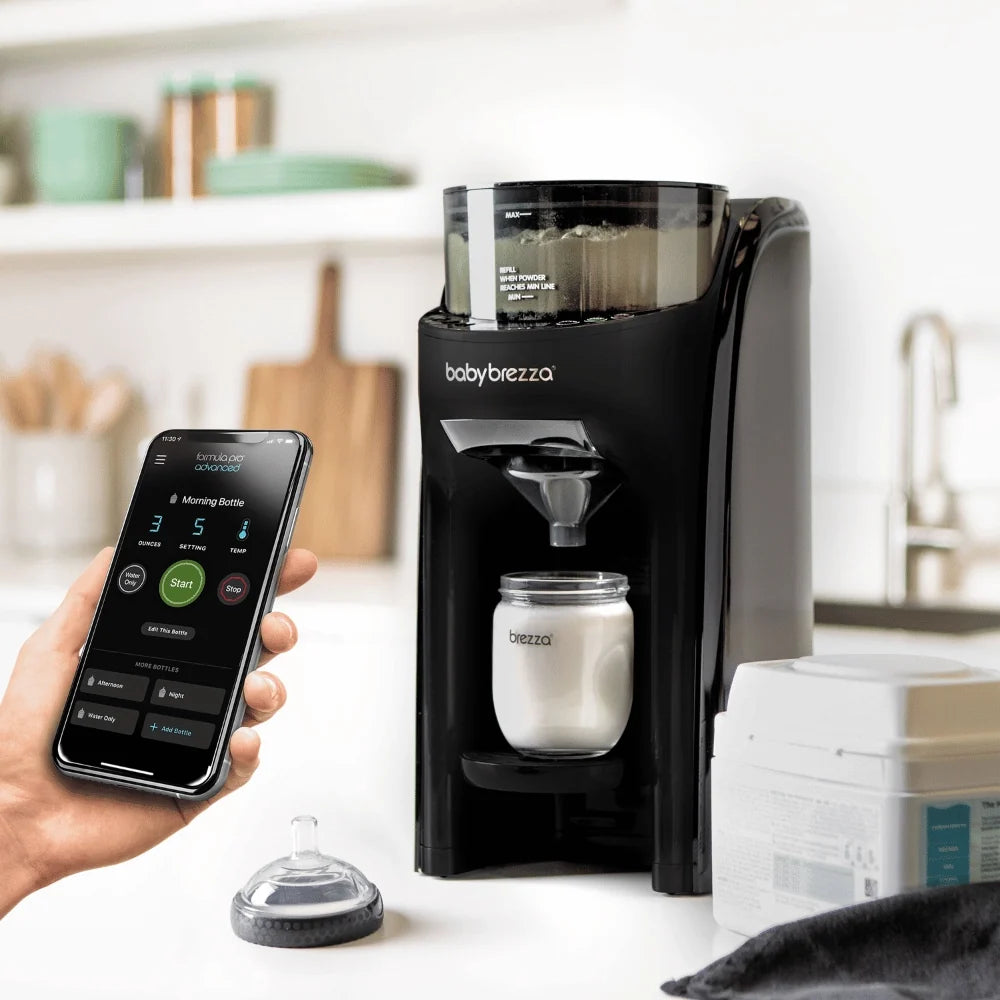 Black baby formula dispenser with smartphone app control and bottle container