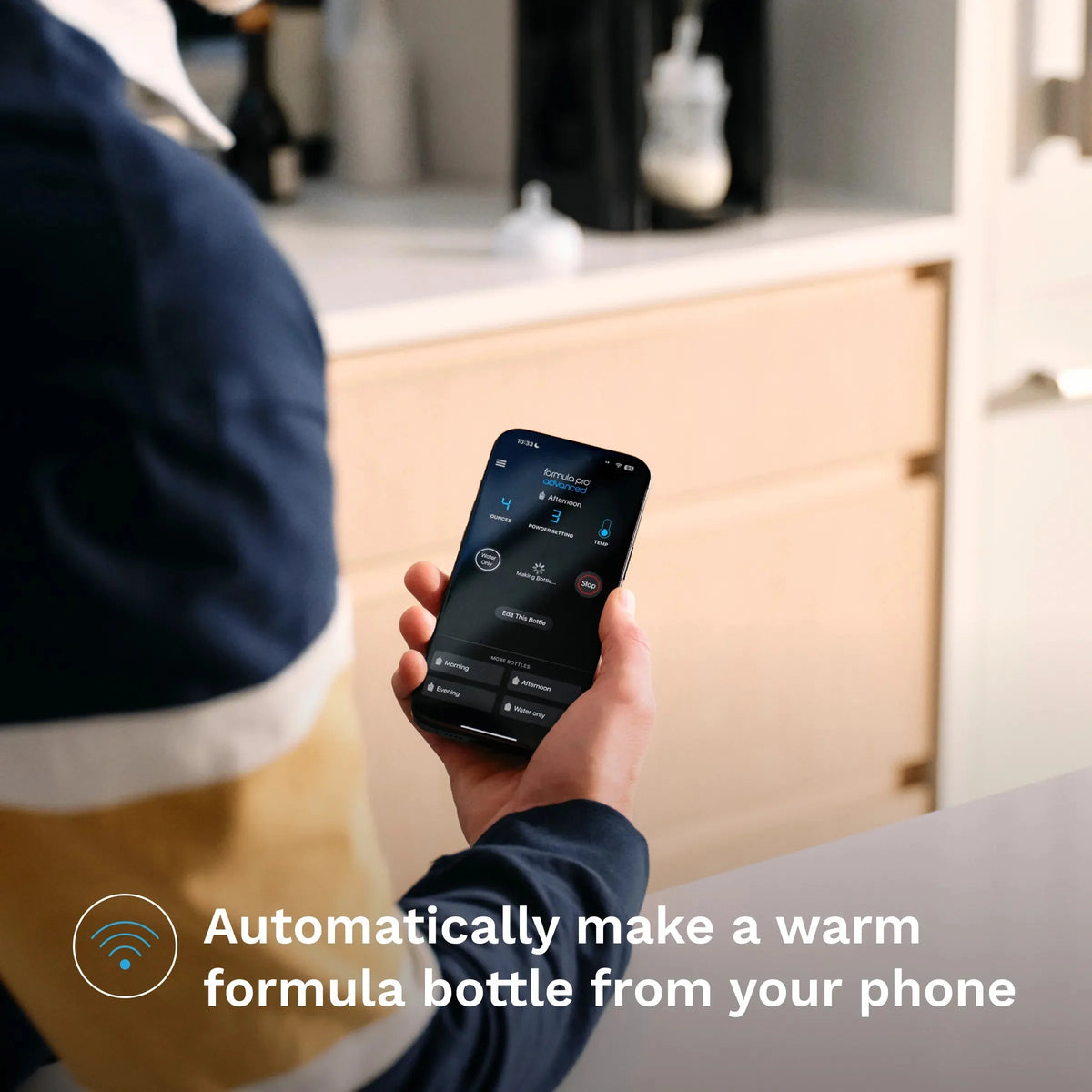 Smartphone controller for baby formula dispenser, showing app screen with start controls