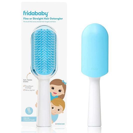 Toddler hair detangling brush with blue flexible bristle pad and white handle