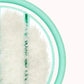 Infant head-hugging hairbrush bristles close-up on teal flexi head