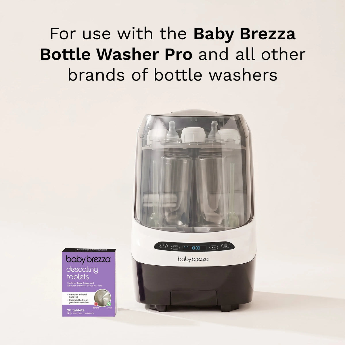 Bottle washer appliance with a small purple descaling tablets box in view.