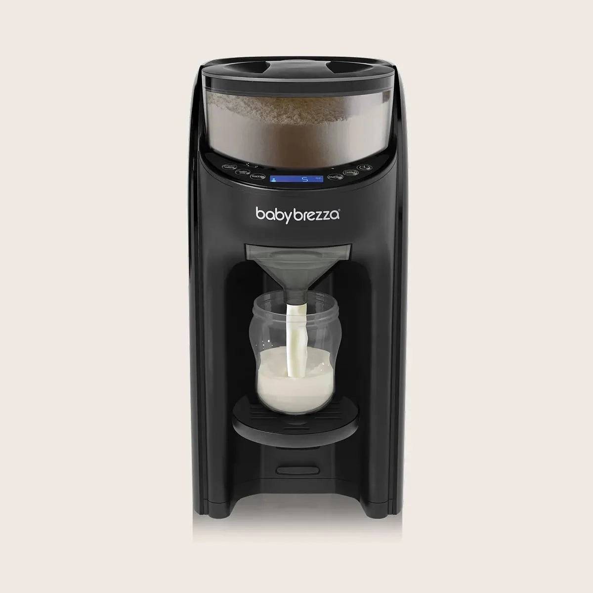 Black automatic formula dispenser with clear top and bottle in front dispensing window